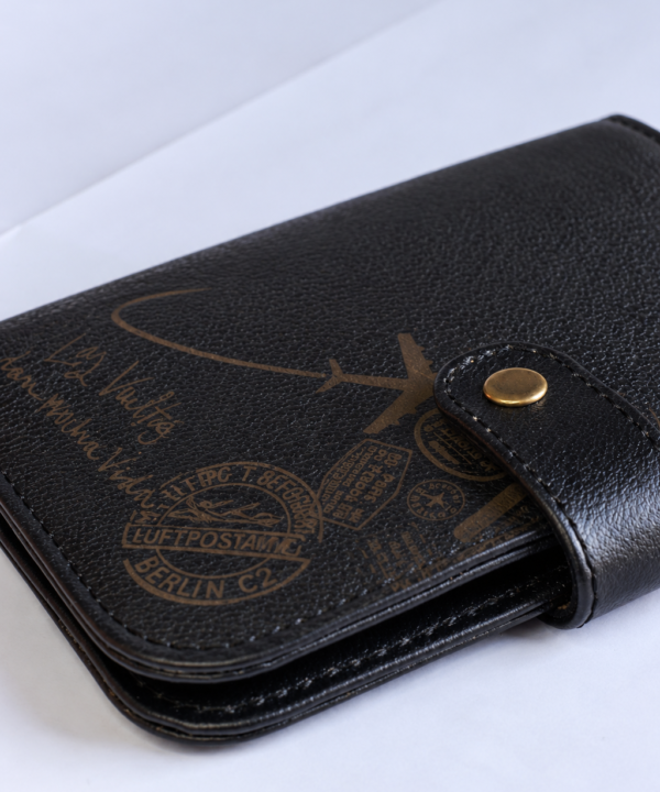 Porta pasaporte Negro
