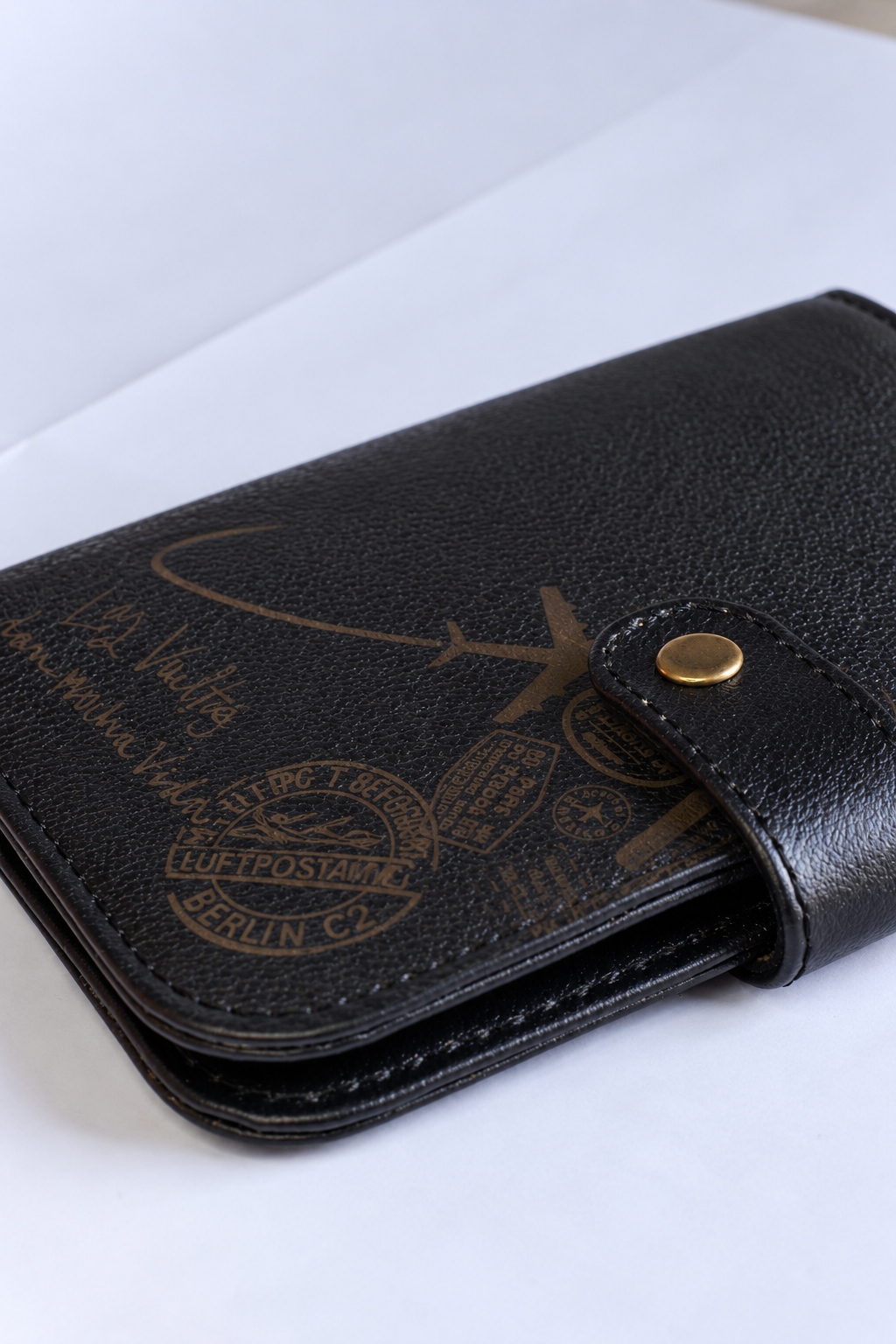 Porta pasaporte Negro